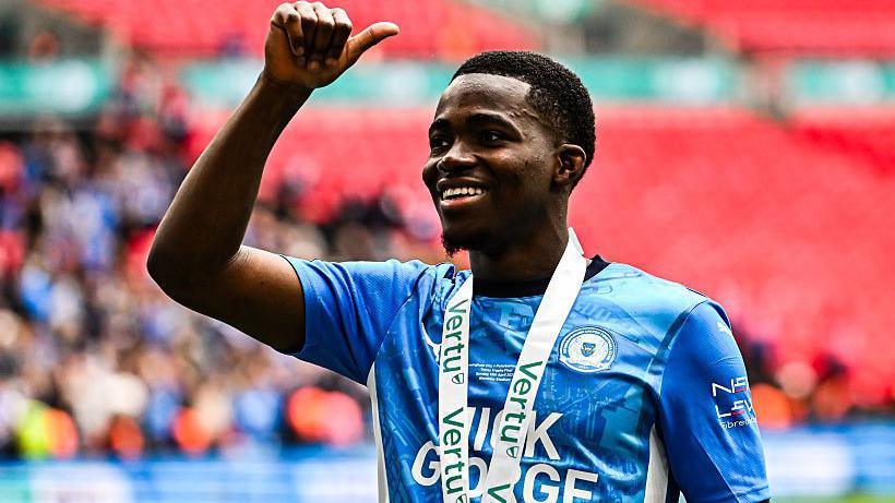Kwame Poku: QPR seal signing of Peterborough winger - BBC Sport