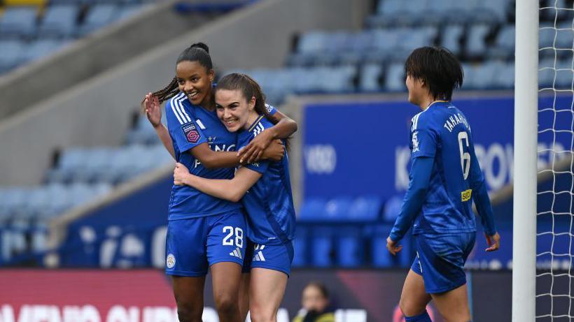 Leicester celebrate their third goal. 