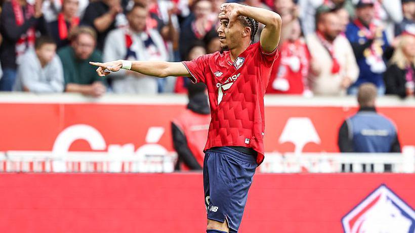 Ethan Mbappe celebrates scoring his first goal for Lille