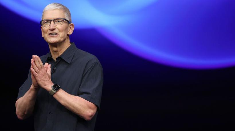 Apple CEO Tim Cook delivers remarks with his hands pressed together in a prayer-like pose before the start of an Apple event at Apple headquarters on September 09, 2024 in Cupertino, California.