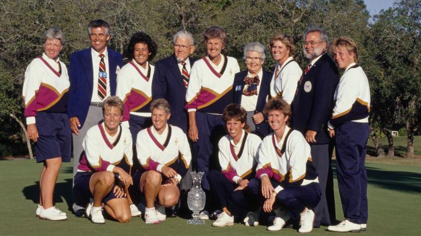 The victorious US team with members of the Solheim family and the Waterford Crystal trophy