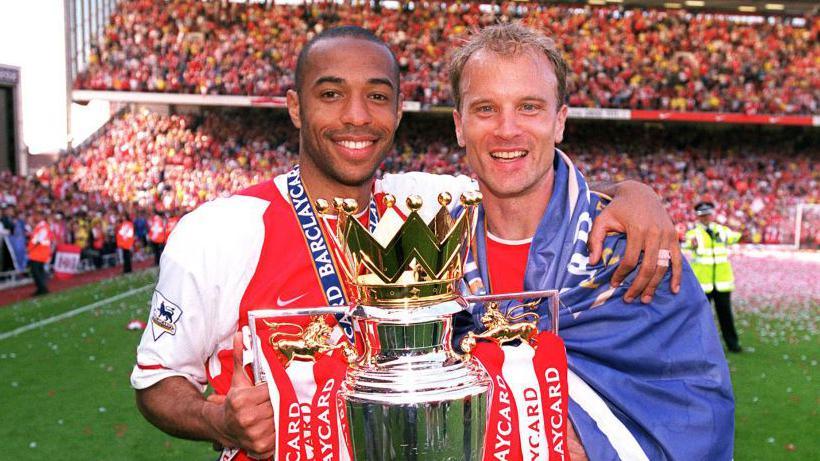 Thierry Henry and Arsenal team-mate Dennis Bergkamp