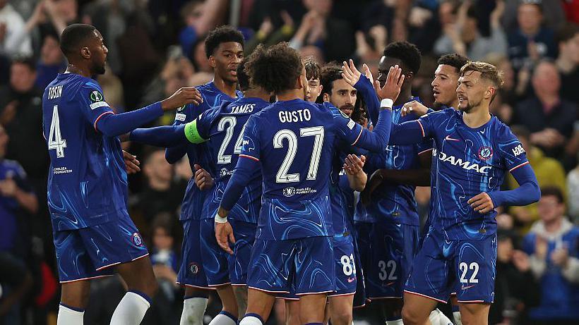 Chelsea players celebrating their goal.