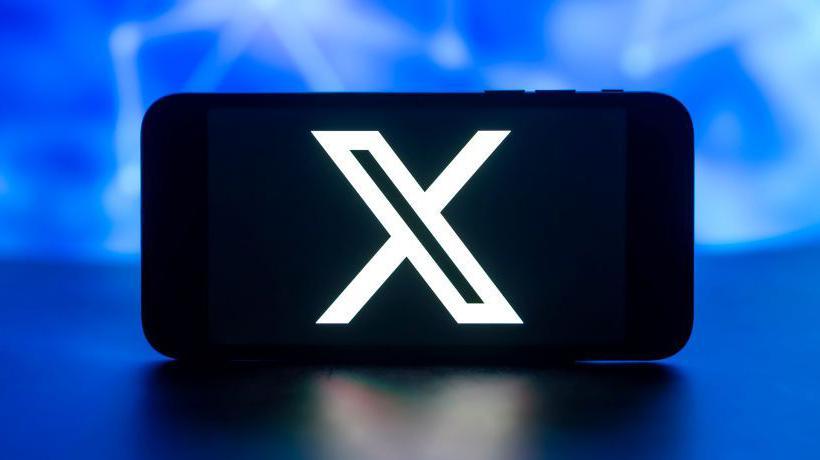 The X logo on a mobile phone