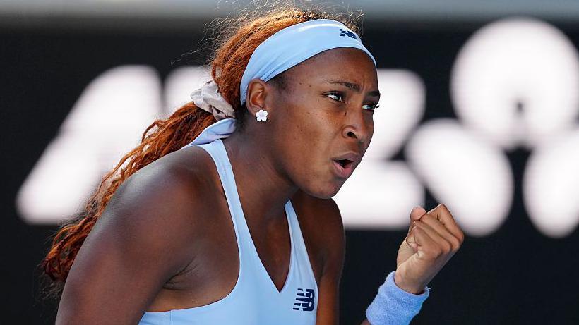 Coco Gauff celebrates winning a point against Hailey Baptiste at the Australian Open