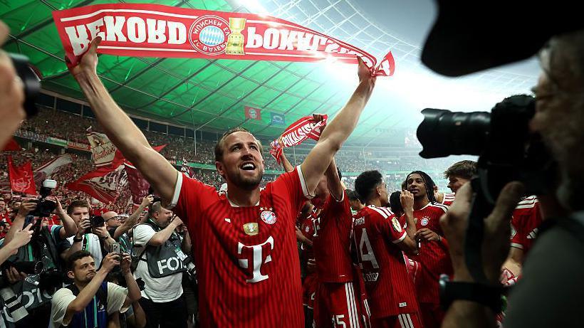 Bayern Munich striker Harry Kane celebrating after German Cup success