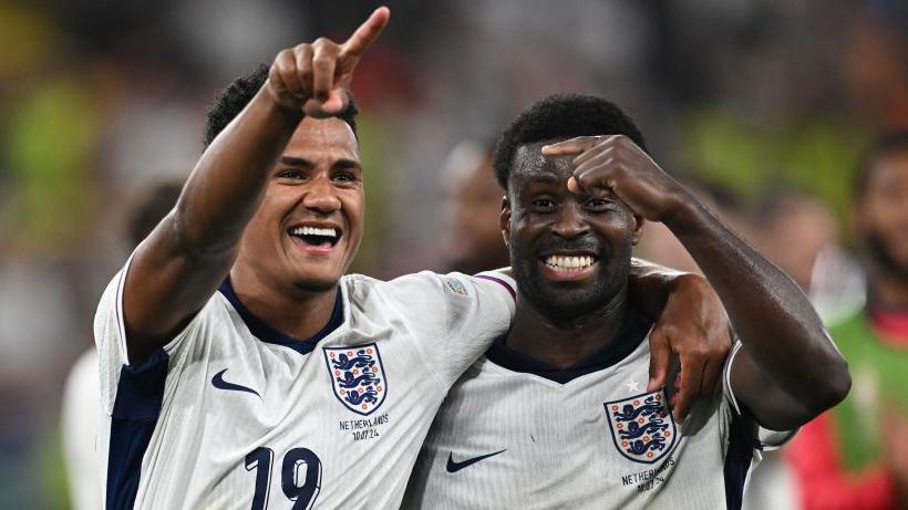 Ollie Watkins and Marc Guehi celebrate