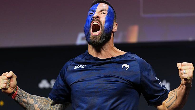 Paul Craig weighs in with the Scotland flag painted on his face