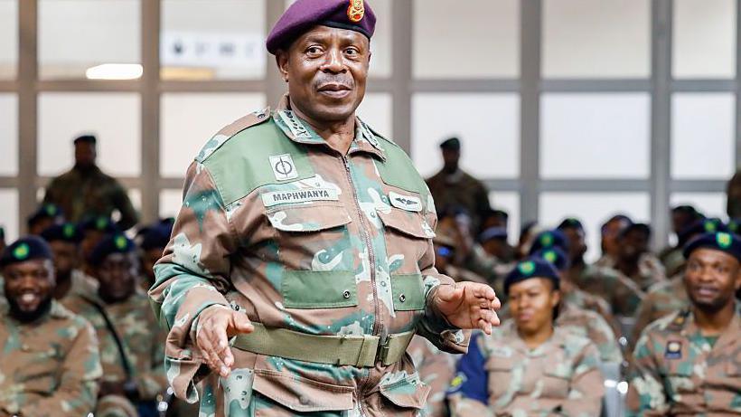 Army chief Gen Rudzani Maphwanya is seen in his military uniform as he speaks during an event