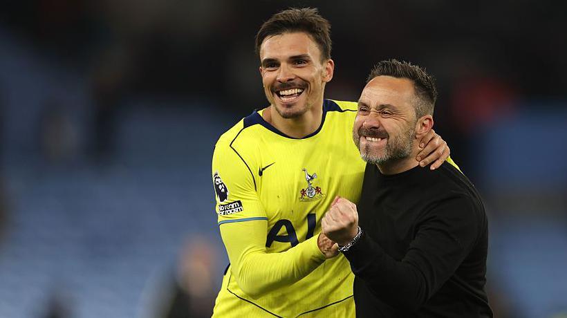 De Zerbi and Joao Palhinha celebrate