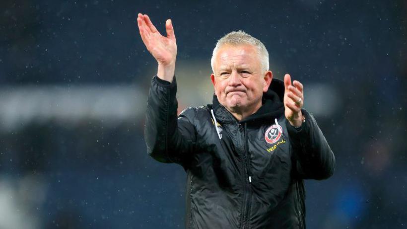 Sheffield United boss Chris Wilder applauds the fans