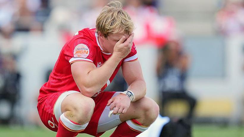 Wales full-back Blair Murray reacts in despair after losing to Japan