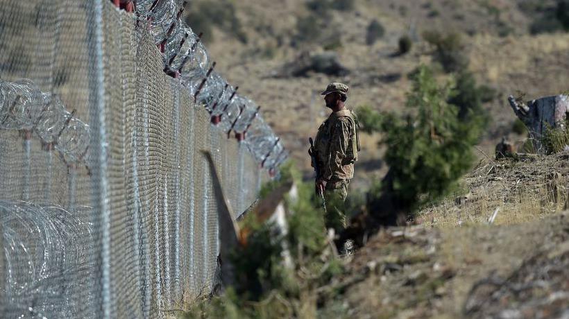 File photo of a soldier standing along the Pakistan-Afghanistan border
