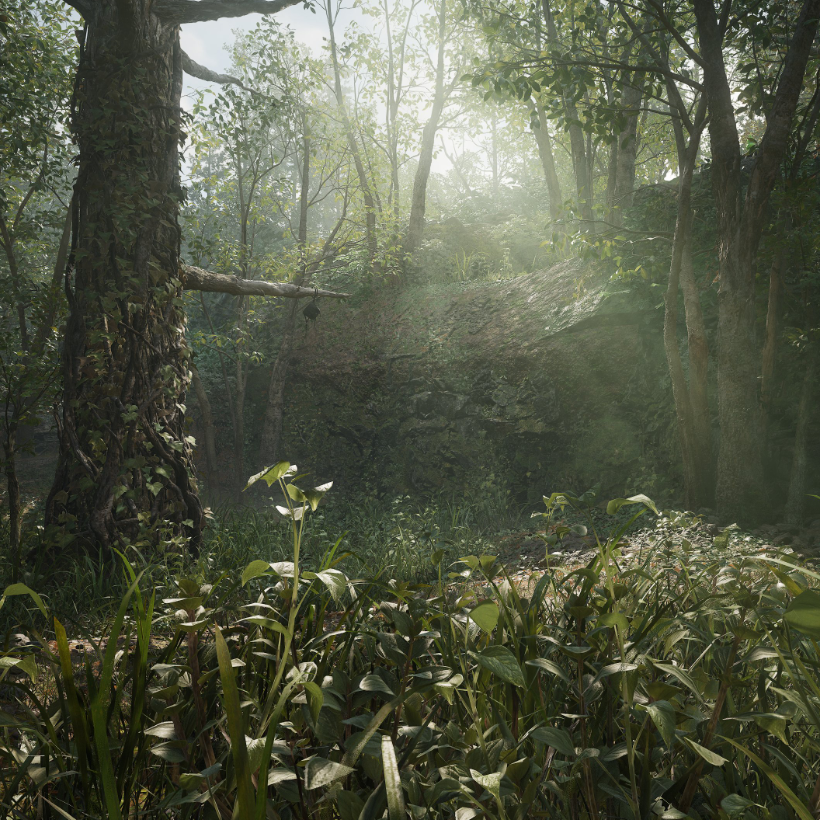A jungle scene rendered in a video game. In the foreground, photo-realistic plants grow in front of a large tree. Several trees in the background are broken up by a beam of light.