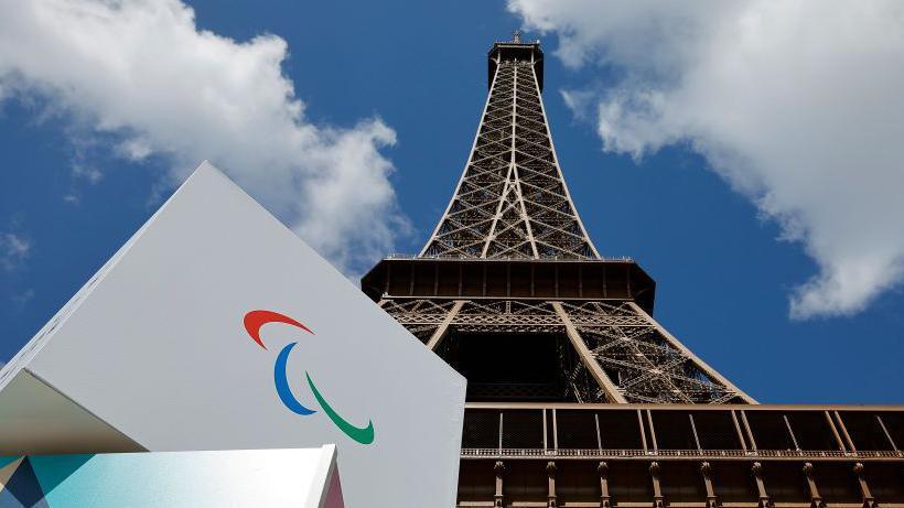 The Paralympic Agitos symbol by the Eiffel Tower