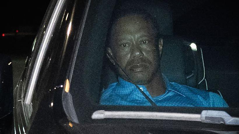 Tiger Woods is seen leaving Martin County Jail in a car after being arrested for driving under the influence following a car crash in Stuart, Florida, on 27 March.