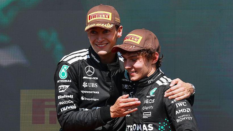 George Russell hugs Mercedes team-mate Kimi Antonelli