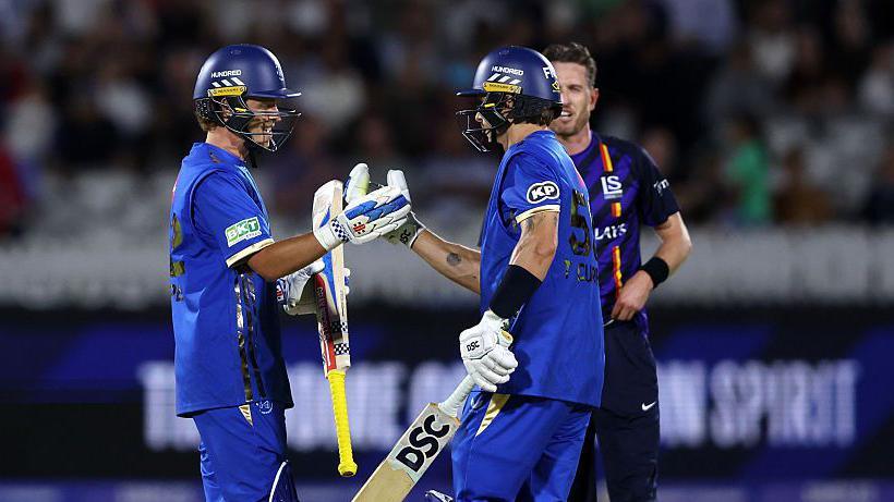 Ollie Pope and Tom Curran celebrate hitting the winning runs for MI London v London Spirit