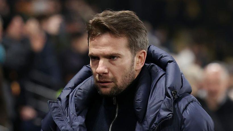 Watford head coach Tom Cleverley looks on from the touchline pre-match