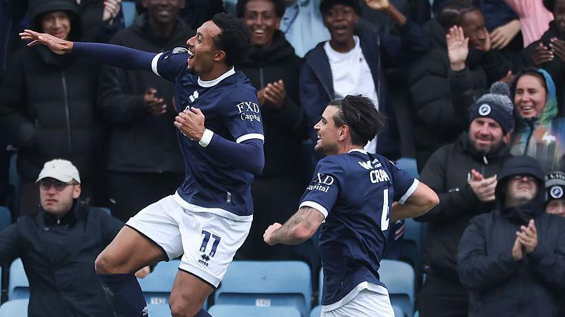 Femi Azeez celebrates