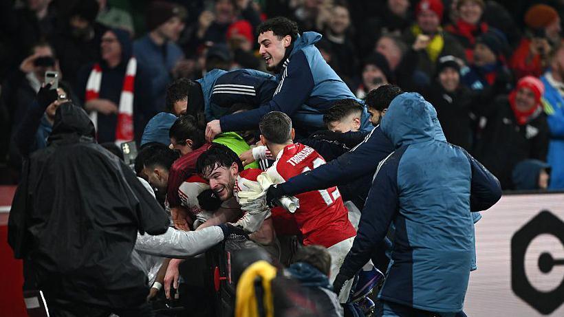 Arsenal celebrate against Chelsea