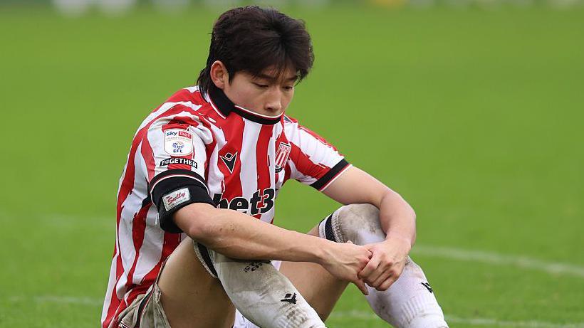 A downcast looking Bae Jun-Ho of Stoke after recent defeat by Hull City
