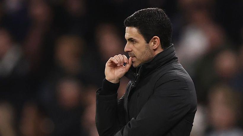 Mikel Arteta looks on thoughtfully during match