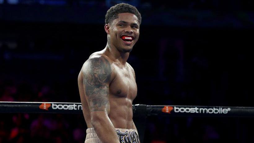 Shakur Stevenson smiles in the ring between action