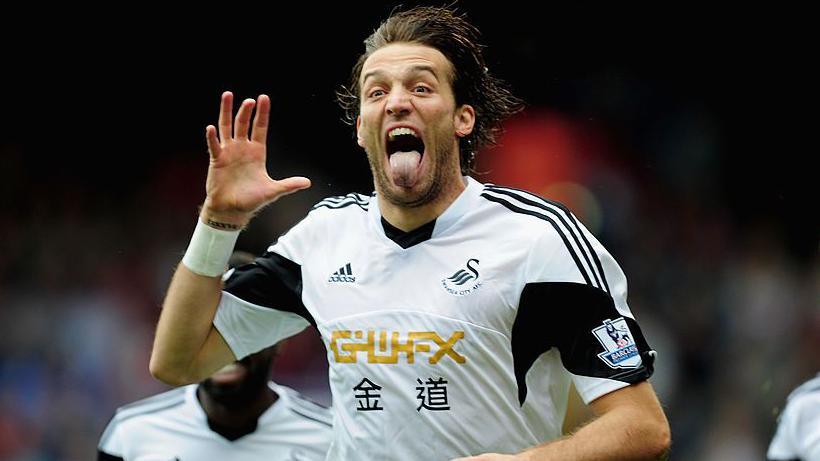 Michu celebrates a Swansea goal