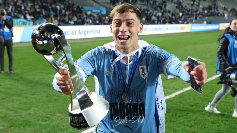 Salford City loan player Nicolas Siri pictured with the Under-20 World Cup in 2023