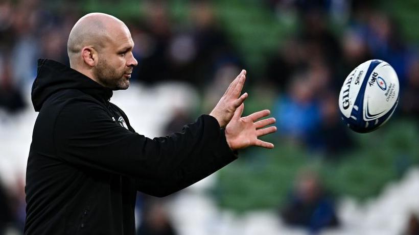 Matt Everard stretches his arms out in preparation to catch the ball