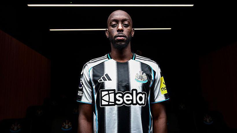Yoane Wissa poses for photographs at the Newcastle United training ground after signing for the club on 1 September, 2025
