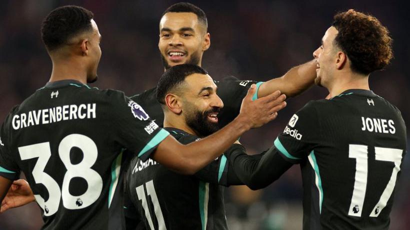 Liverpool players celebrate Mohamed Salah's goal in the Premier League clash at West Ham United