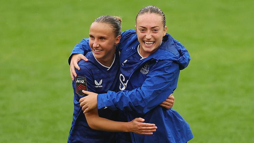 Rosa van Gool (left) and Ornella Vignola (right) hug at the end of Everton's 4-1 win over Liverpool