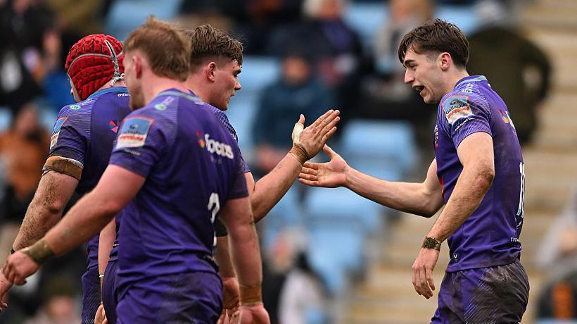 Exeter players celebrate
