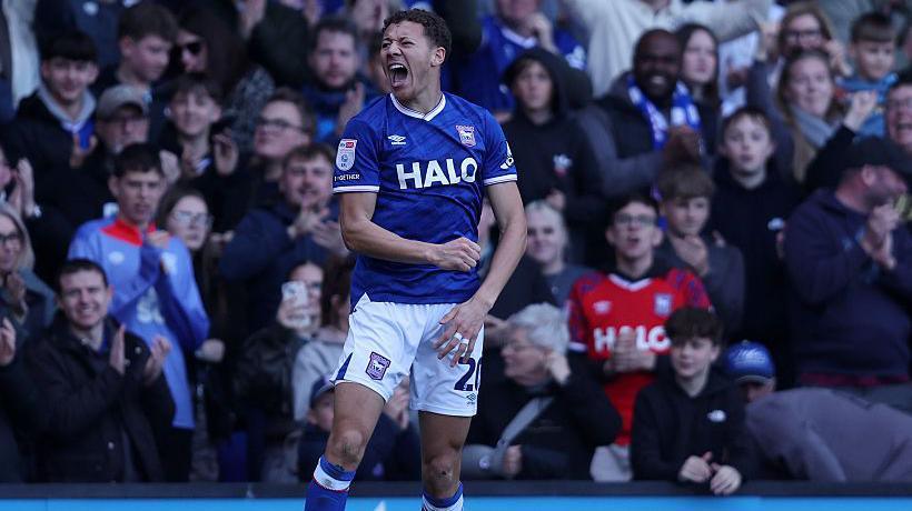 Kasey McAteer punches the air in delight after scoring his first goal for Ipswich to give them the lead against Birmingham.