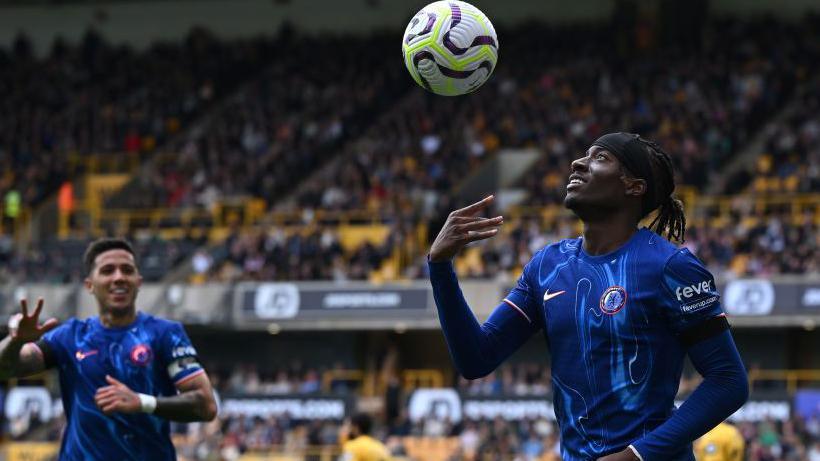 Noni Madueke celebrates scoring a hat-trick against Wolves