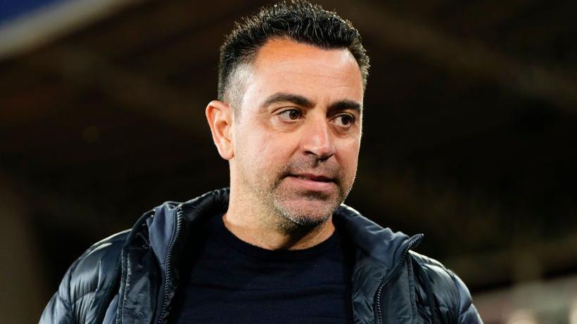 Xavi looks on during Barcelona's recent game against Almeria