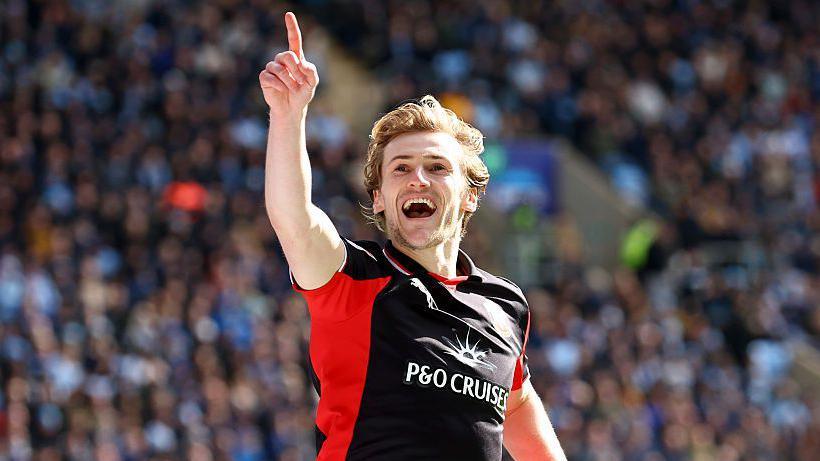 Southampton midfielder Flynn Downes celebrates his goal at Coventry City