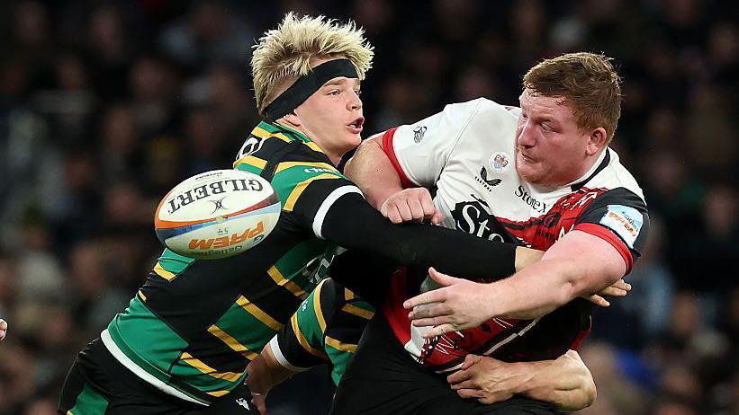 Rhys Carre is tackled by Henry Pollock
