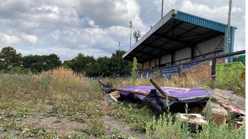 FC Farsley's ground with a derelict stand and overgrown pitch