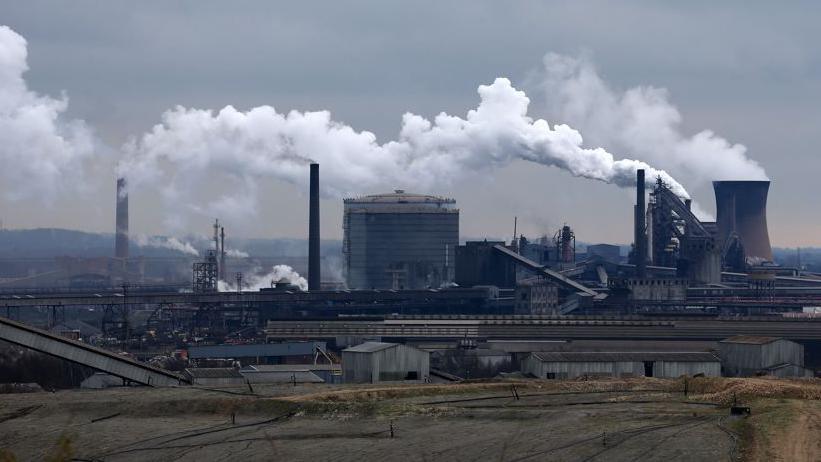 Chimney stacks and other buildings - part of Scunthorpe's steelworks - dominate the town's skyline