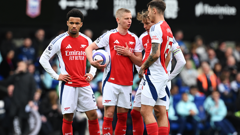 Oleksandr Zinchenko of Arsenal speaks to team-mates Ethan Nwaneri and Martin Odegaard during the Premier League match against Ipswich Town