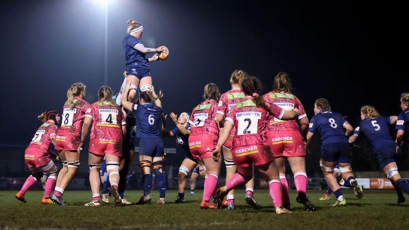 Gloucester-Hartpury and Sale challenge the ball from a line-out during their match