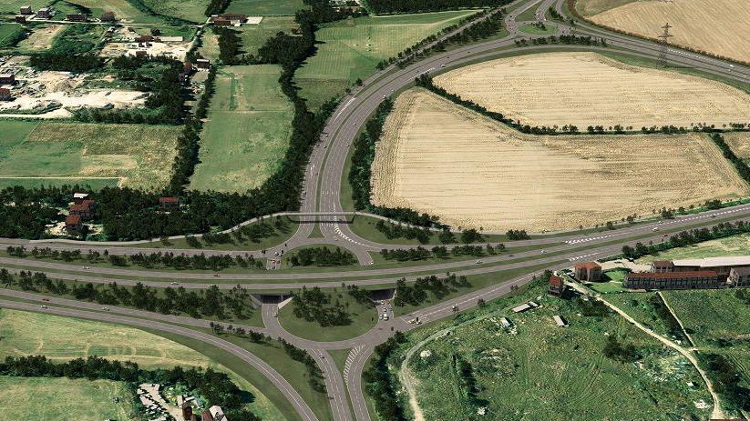 A CGI image of a large roundabout pictured from above. It is served by several roads and has four raised carriageways running above it. To the north is another smaller roundabout, called the Rayleigh Spur roundabout. Both are surrounded by fields.