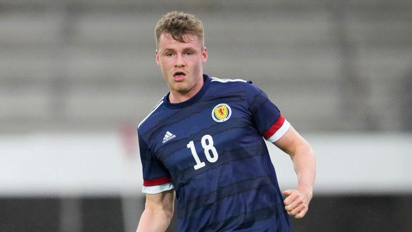 Jack Burroughs in action for Scotland U21s