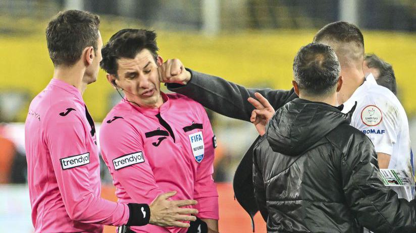 Referee Halil Umut Meler is punched in the face by then-Ankaragucu president Faruk Koca.