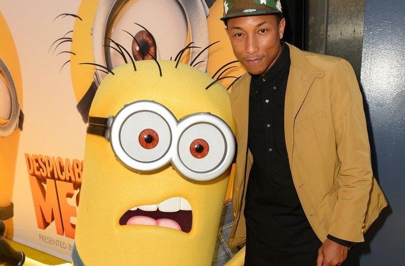 Pharrell at the Despicable Me 2 premier with a minon