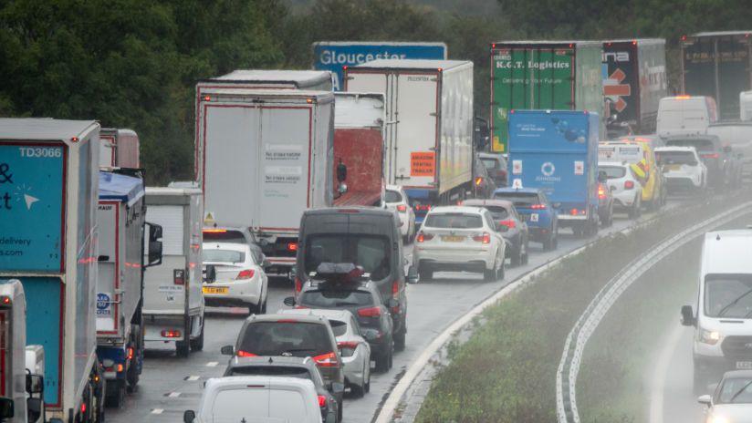 Two lanes of motorway congestion queue on a motorway.