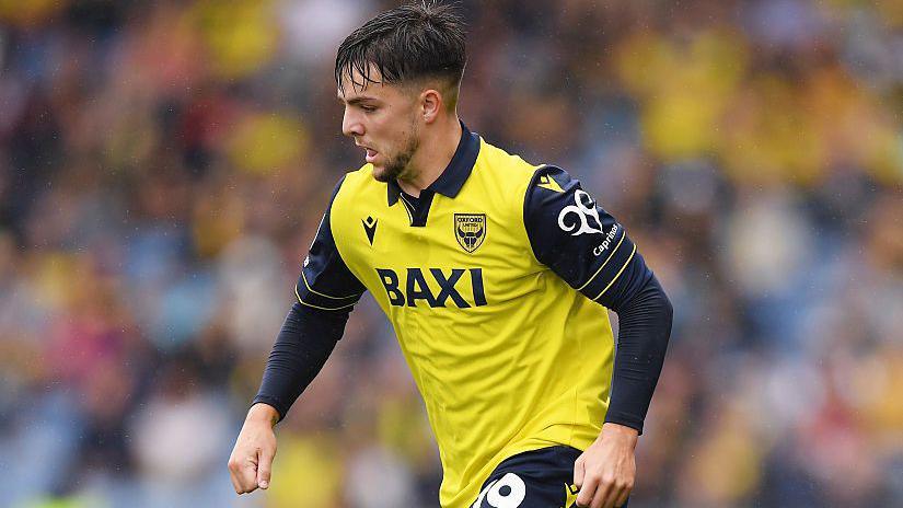 Tyler Goodrham of Oxford United in action for his side as he dribbles with the ball